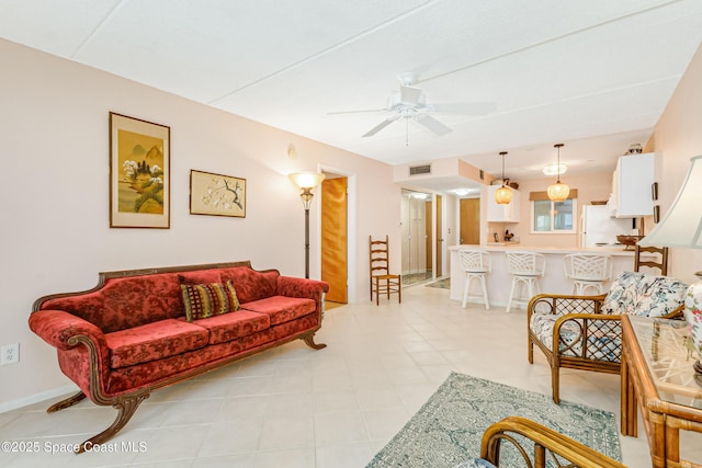 living room with ceiling fan