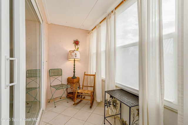 sitting room with light tile patterned floors