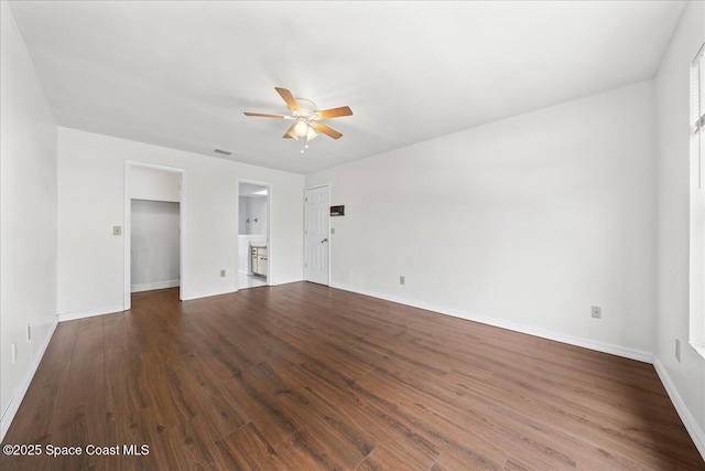 spare room featuring hardwood / wood-style flooring and ceiling fan