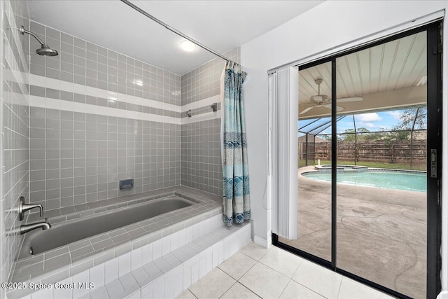 bathroom featuring tile patterned flooring, shower / bath combination with curtain, and ceiling fan