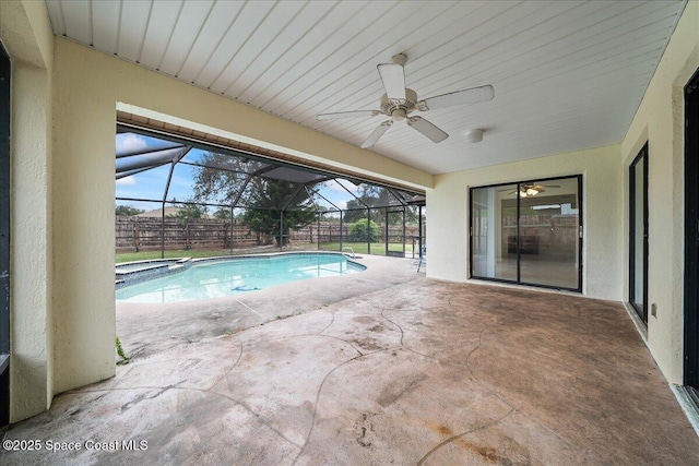 view of swimming pool featuring an in ground hot tub, a patio area, ceiling fan, and a lanai