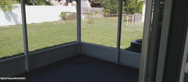 unfurnished sunroom with plenty of natural light