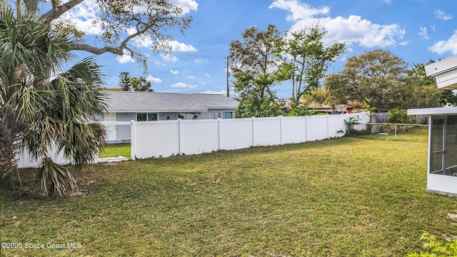 view of yard with fence