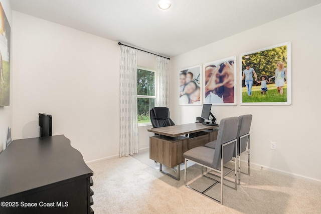 home office featuring light colored carpet