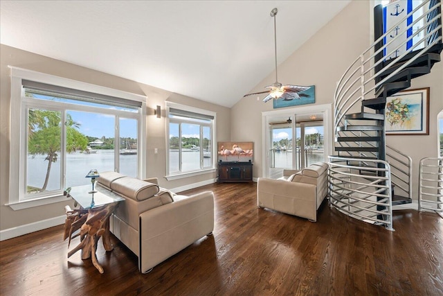 living room with dark hardwood / wood-style floors, high vaulted ceiling, and ceiling fan