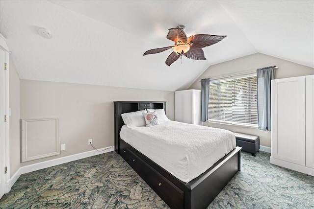 bedroom with vaulted ceiling and ceiling fan