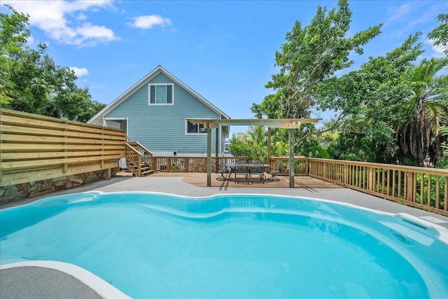 view of pool with a deck