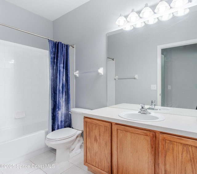 full bathroom with tile patterned flooring, shower / tub combo, vanity, and toilet