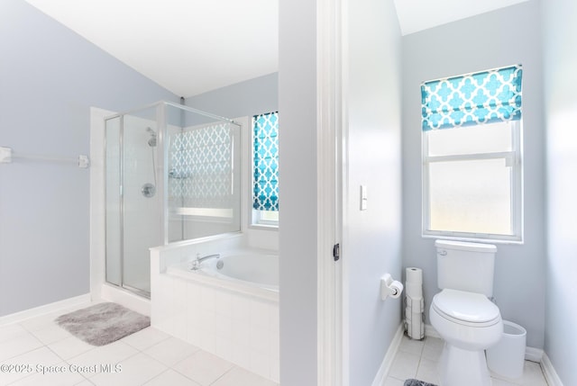 bathroom with tile patterned floors, plus walk in shower, and toilet