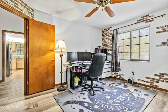 office area featuring ceiling fan and light hardwood / wood-style flooring