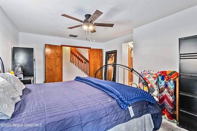 bedroom featuring ceiling fan