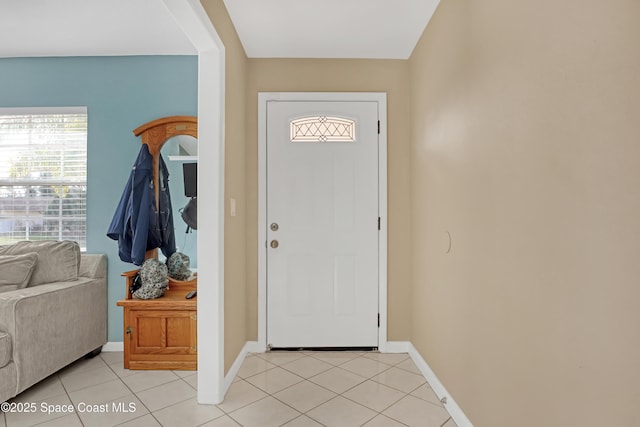 entryway featuring light tile patterned floors