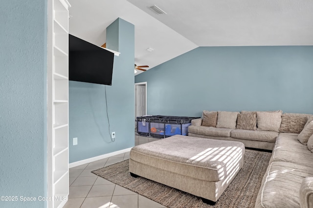 tiled living room featuring vaulted ceiling and ceiling fan