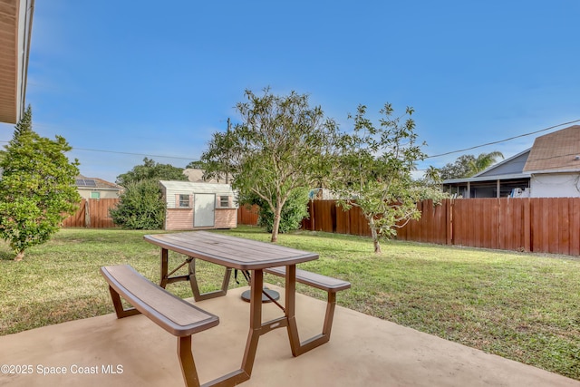 view of patio featuring a storage shed