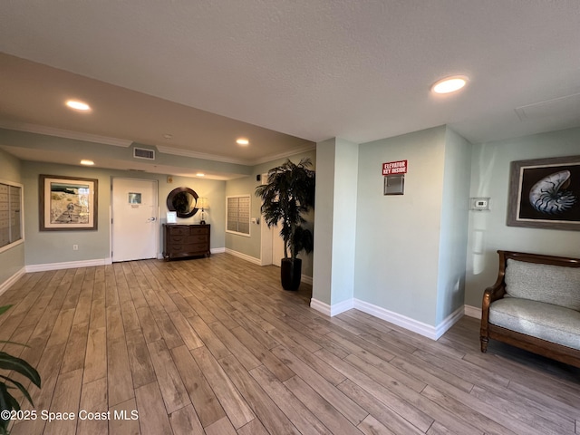 unfurnished living room featuring light wood-type flooring