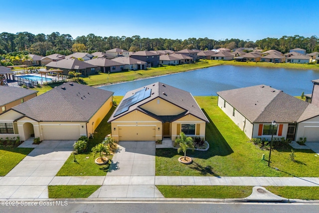 drone / aerial view with a water view