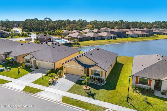 aerial view featuring a water view