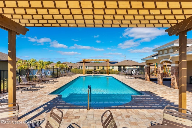 view of pool featuring a pergola and a patio