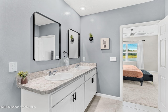 bathroom featuring tile patterned floors, ceiling fan, and vanity