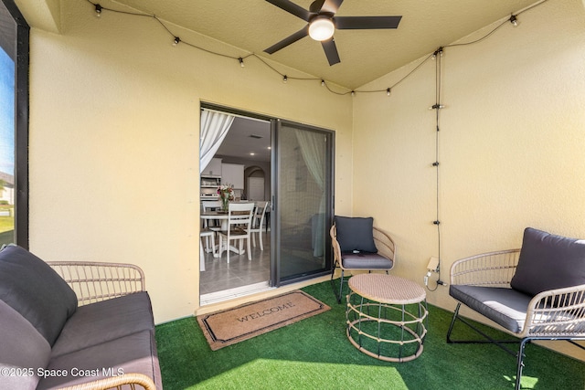 view of patio featuring ceiling fan