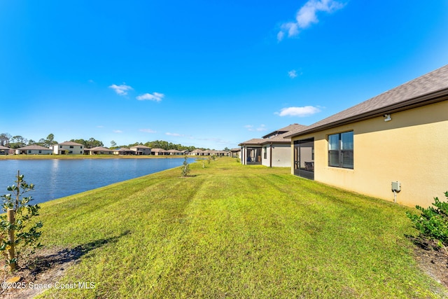 view of yard featuring a water view