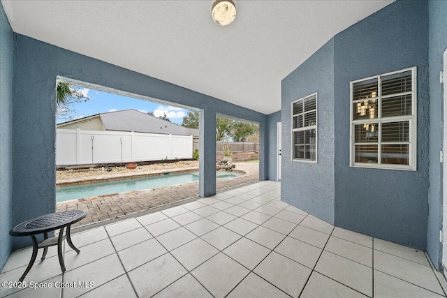 view of patio featuring a fenced in pool