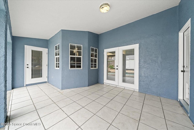 view of patio featuring french doors