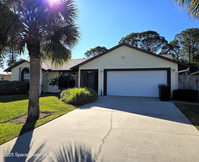 ranch-style house with a front lawn and a garage