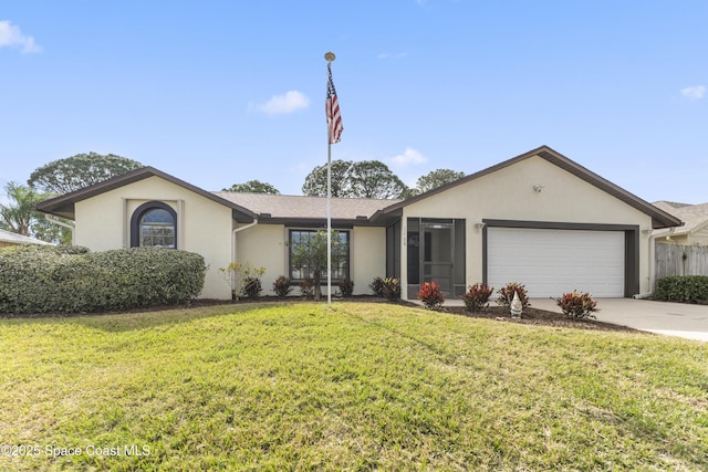 ranch-style home with a garage and a front yard