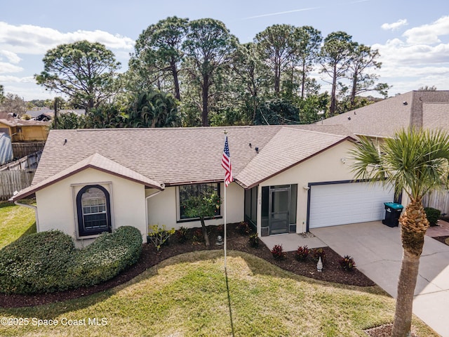 ranch-style home with a garage and a front yard