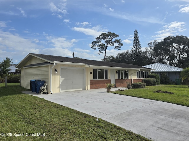 ranch-style house featuring a front lawn and a garage