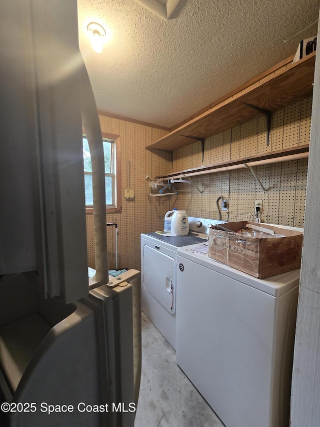 laundry room featuring washer and dryer