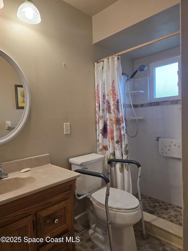 bathroom featuring toilet, tile patterned flooring, a shower with shower curtain, and vanity