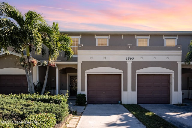 view of front of property with a garage