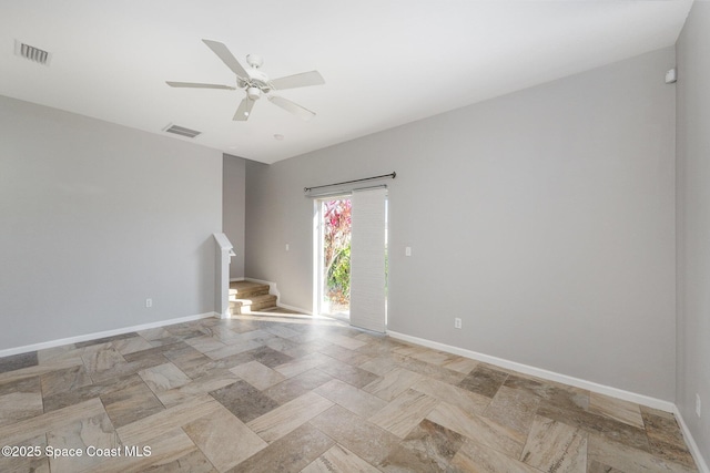 spare room featuring ceiling fan