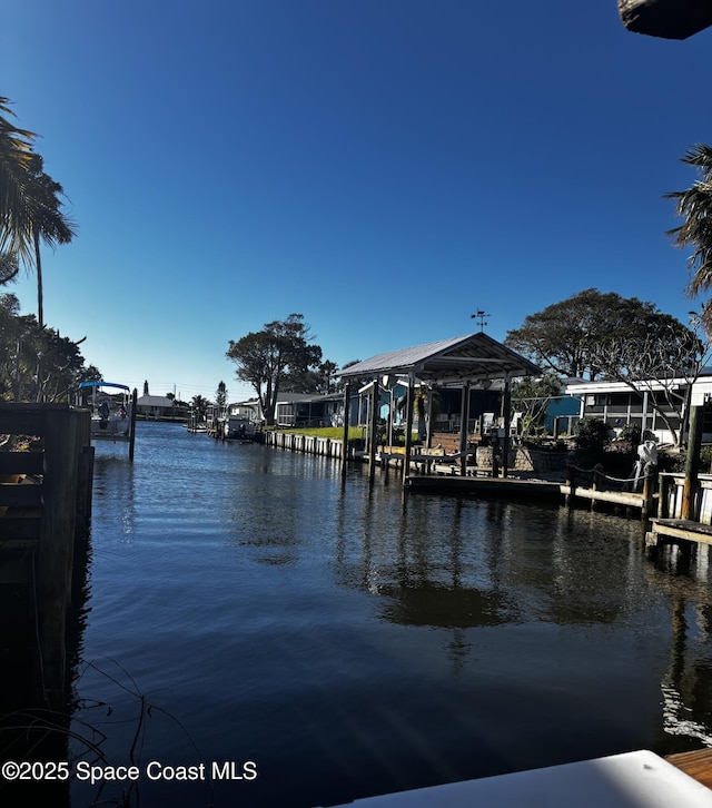 dock area featuring a water view