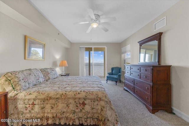 bedroom with ceiling fan, light carpet, and access to outside