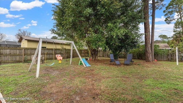 view of yard featuring a playground