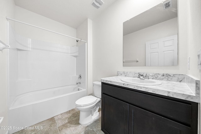 full bathroom with vanity,  shower combination, and toilet