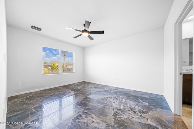 spare room featuring ceiling fan