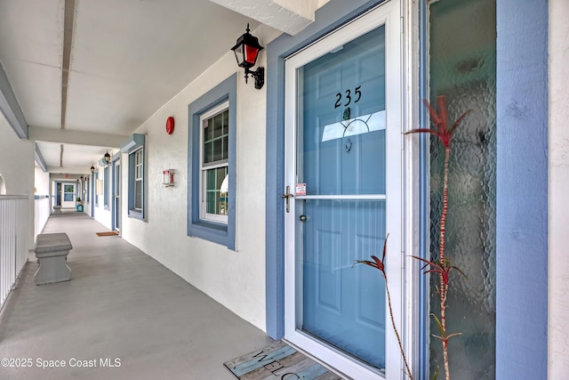 entrance to property with a porch