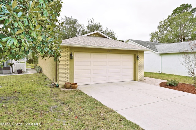 garage with a lawn