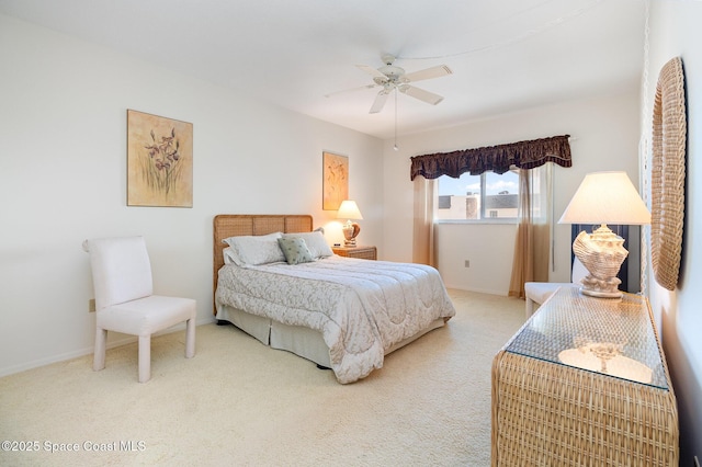 bedroom featuring ceiling fan, carpet floors, and baseboards