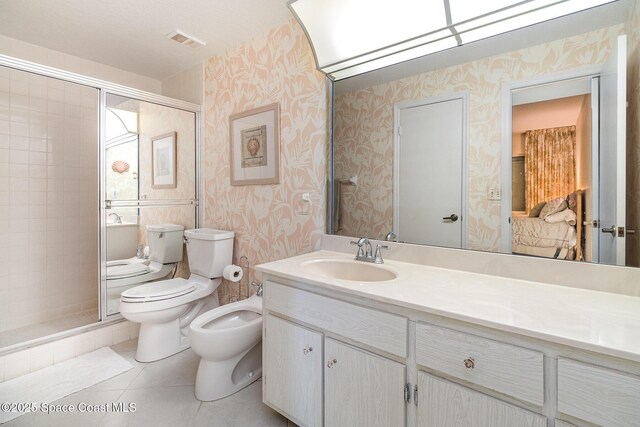 full bath featuring a bidet, toilet, vanity, a stall shower, and wallpapered walls