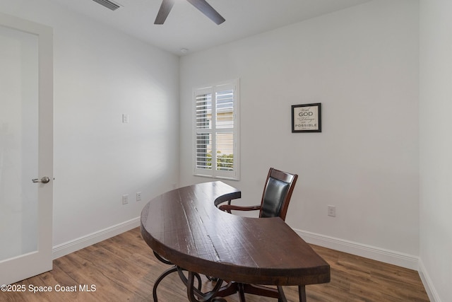 office area featuring wood-type flooring and ceiling fan