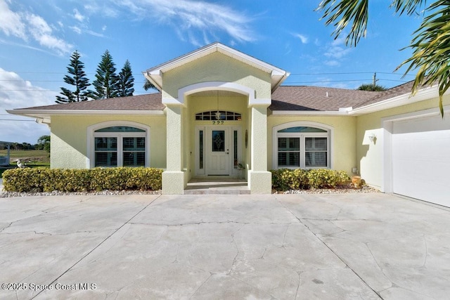 view of front of home featuring a garage