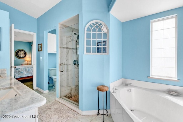 full bathroom featuring a healthy amount of sunlight, tile patterned flooring, toilet, vanity, and independent shower and bath