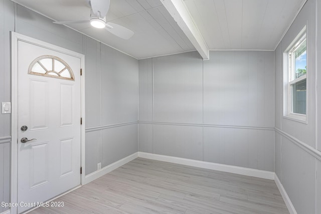 entrance foyer featuring ceiling fan, beam ceiling, and light wood-type flooring