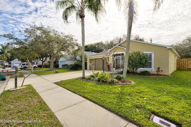 view of side of home featuring a lawn