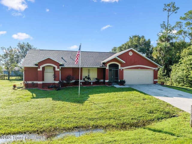 ranch-style home with a front yard and a garage